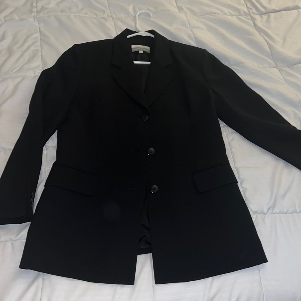 Solid black blazer with button up option and 2 pockets Size 12